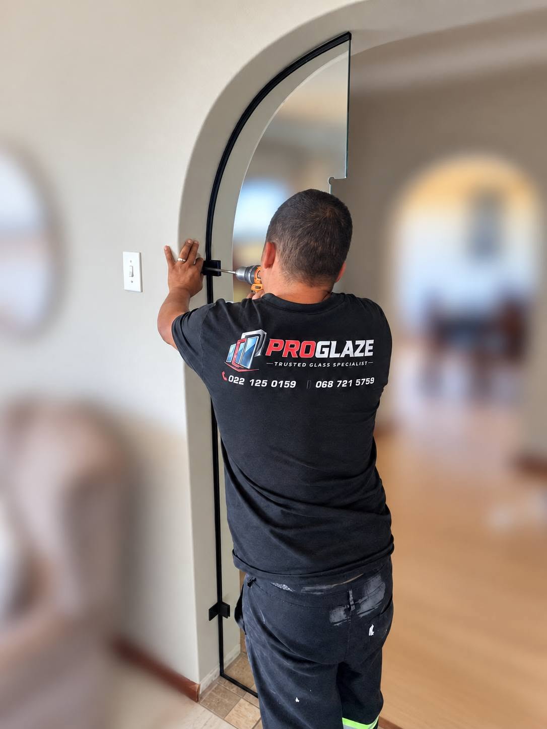 Fitting an arched glass door