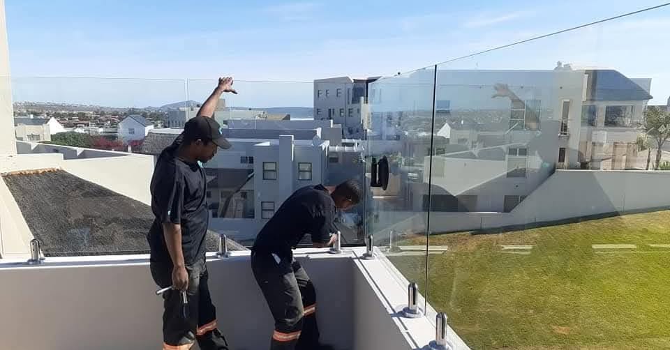 Our team installing a rooftop balustrade
