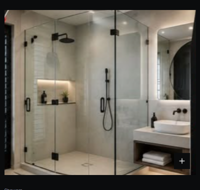 Frameless corner shower with black fittings