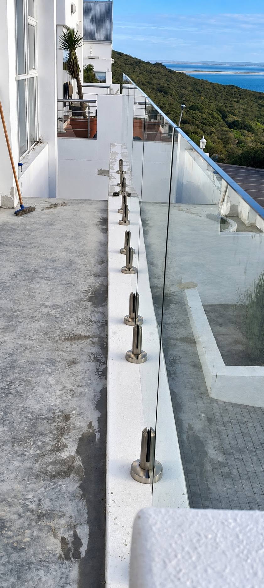 Balustrade glass on polished spigots
